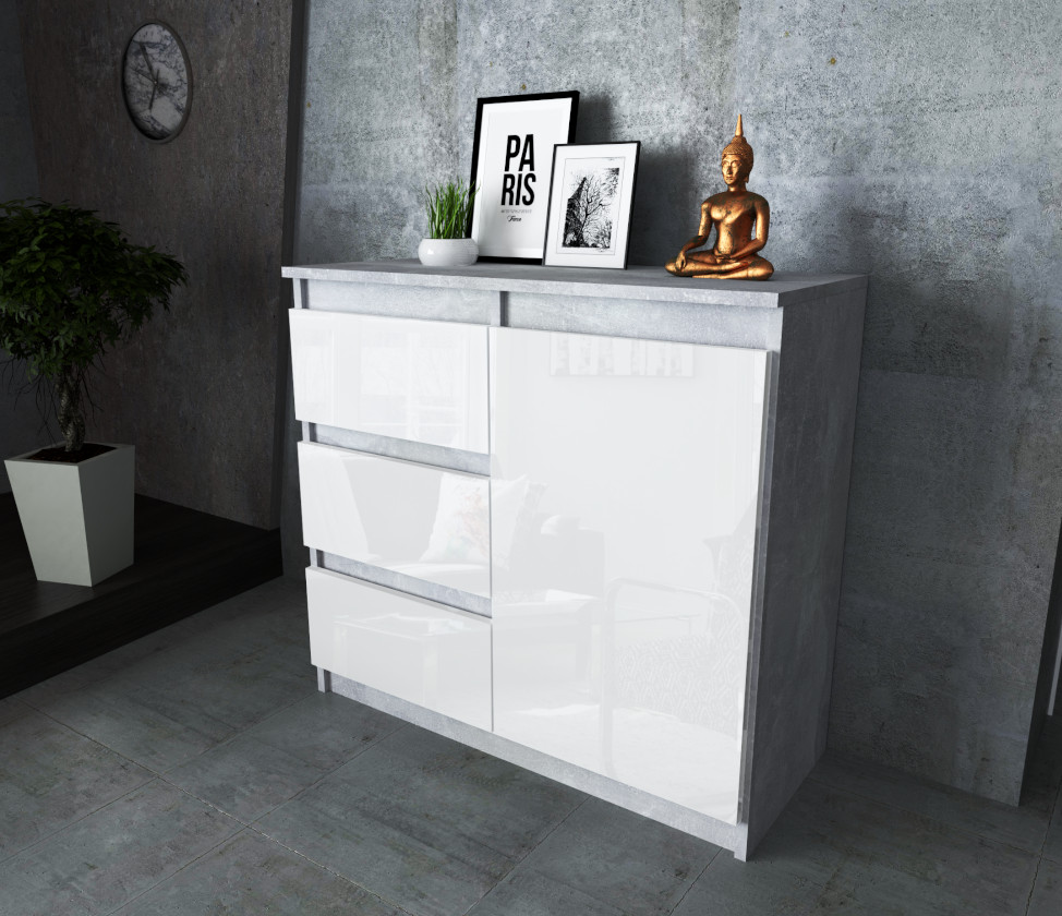 Komoda Agnes 80cm z 1 drzwiami i 3 szufladami na tle rzeczywistym z korpusem w kolorze beton i frontami w kolorze bialy polysk